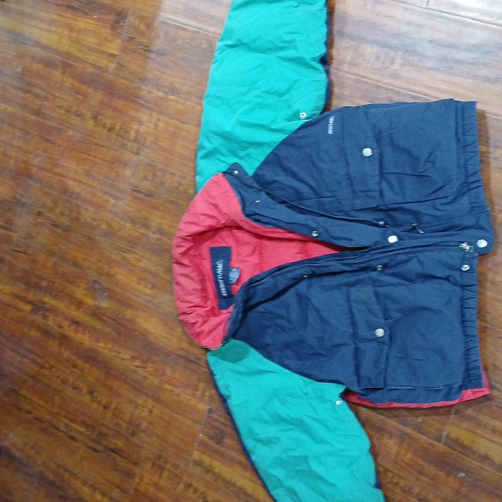 Snow jacket for adult men, heavy , puffy, green with blue and red.